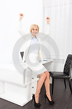 Business woman excited hands up raised arms