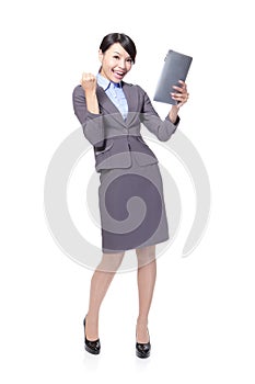 Business woman excited using Tablet PC