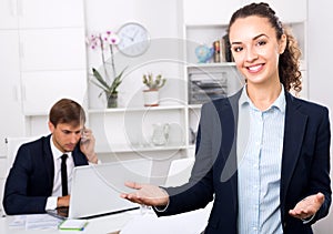 Business woman executive manager standing in company office