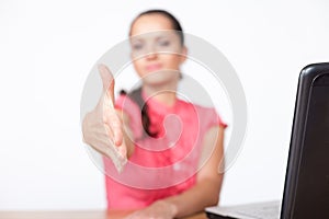 Business woman extending hand to shake