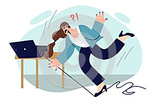 Business woman falls in office after tripping over computer cable and risks injury