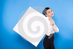 Business woman in formal wear with white panel on blue background