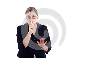 Business woman gesturing silence sign