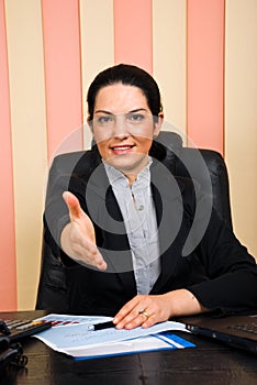 Business woman giving handshake or welcome