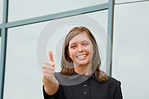 Business Woman Giving a Thumbs Up