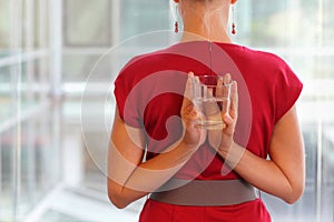 Business woman with glass of water - healhy lifestyle