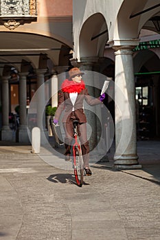 Business woman go to work in monocycle