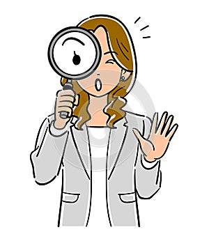 Business woman in gray jacket with magnifying glass