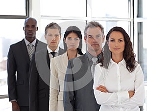 Business woman with group in background