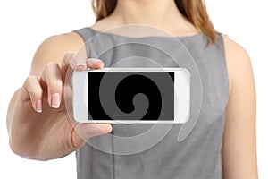 Business woman hand displaying a blank smart phone screen photo