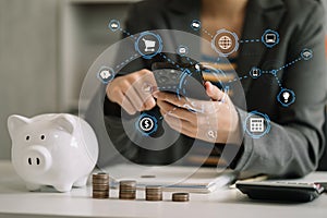 Business woman hand holding coins to stack on desk concept saving money finance and accounting