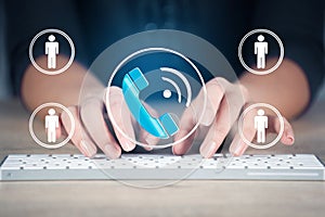 Business woman hand keyboard with  virtual screens.