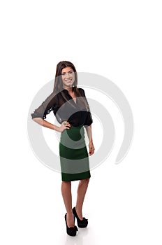 Business woman with hand on waist in full lenght pose