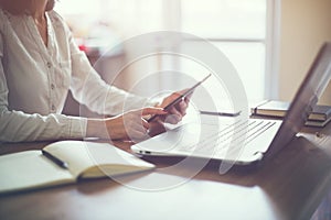 Business woman hand working laptop computer on