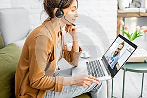 Business woman having a video call with coworker