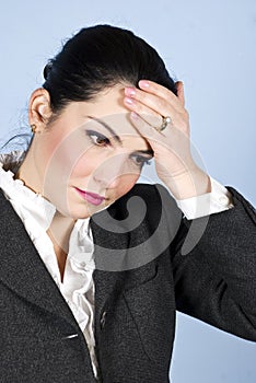 Business woman with headache or problems