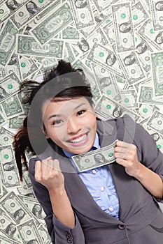 Business woman hold fist with money