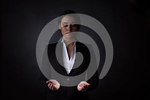 Business woman holding abstract glowing object