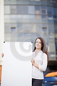 Business woman holding banner