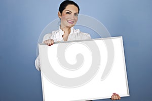 Business woman holding a blank sign