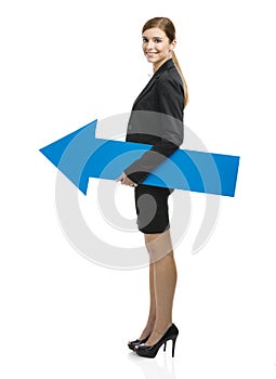 Business woman holding a blue arrow