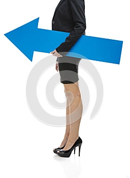 Business woman holding a blue arrow