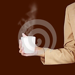 Business woman holding a cup of coffee