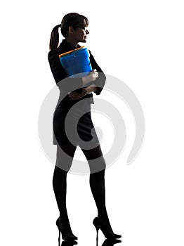 Business woman holding folders files standing silhouette