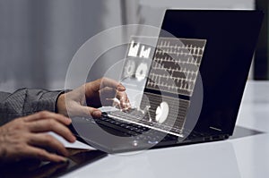 Business woman holding hand on laptop