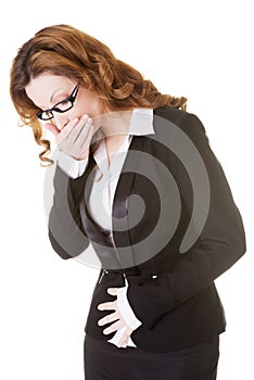 Business woman holding her stomach and covering mouth.