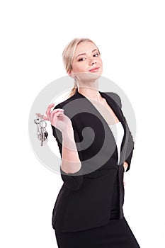 Business woman holding keys over white background.