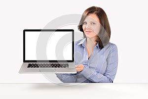 Business woman is holding a laptop photo