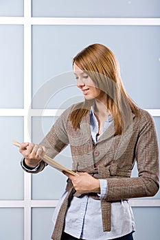 Business woman holding legal documents