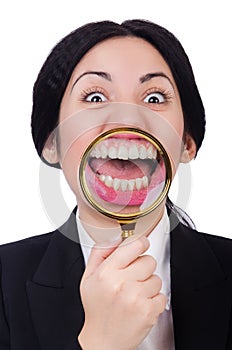 Business woman holding magnifying glass isolated