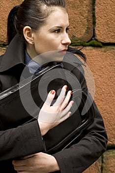 Business woman holding portfolio