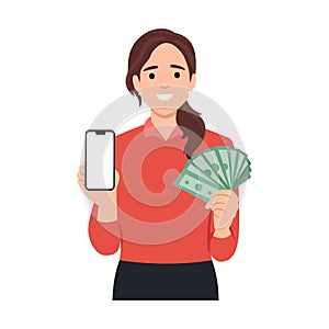 Business woman holding smartphone and dollars. Showing blank screen phone for copy space