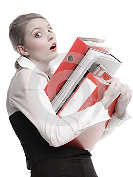 Business woman holding stack of folders documents