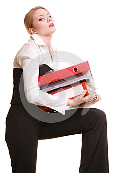 Business woman holding stack of folders documents