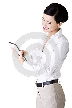 Business woman holding tablet computer