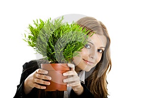Business Woman holding a vase with a plant