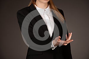 Business woman holds avirtual  grphic in her hand