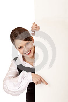 Business woman holds blank advertisement board photo