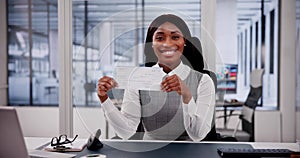 Business Woman Holds Checkbook, Examining Paycheck