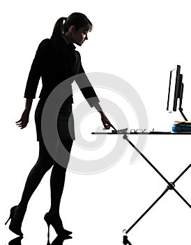 Business woman igniting computer computing silhouette