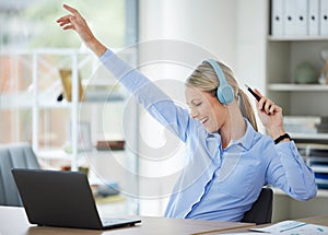 Business woman at internet laptop, fun professional girl dancing at office, happy employee headphones in office. Admin