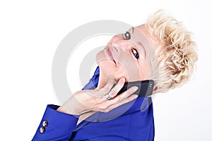 Business woman in jacket talking on the phone