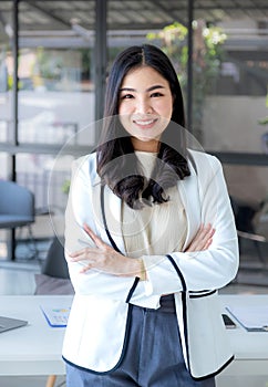 Business woman joyful smiling bookkeeper\'s standing in the working office