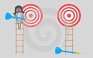 Business woman on ladder holding a blue dart. Dartboard. Isolated.