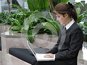 Business woman with a laptop