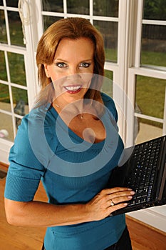 Business woman with laptop computer